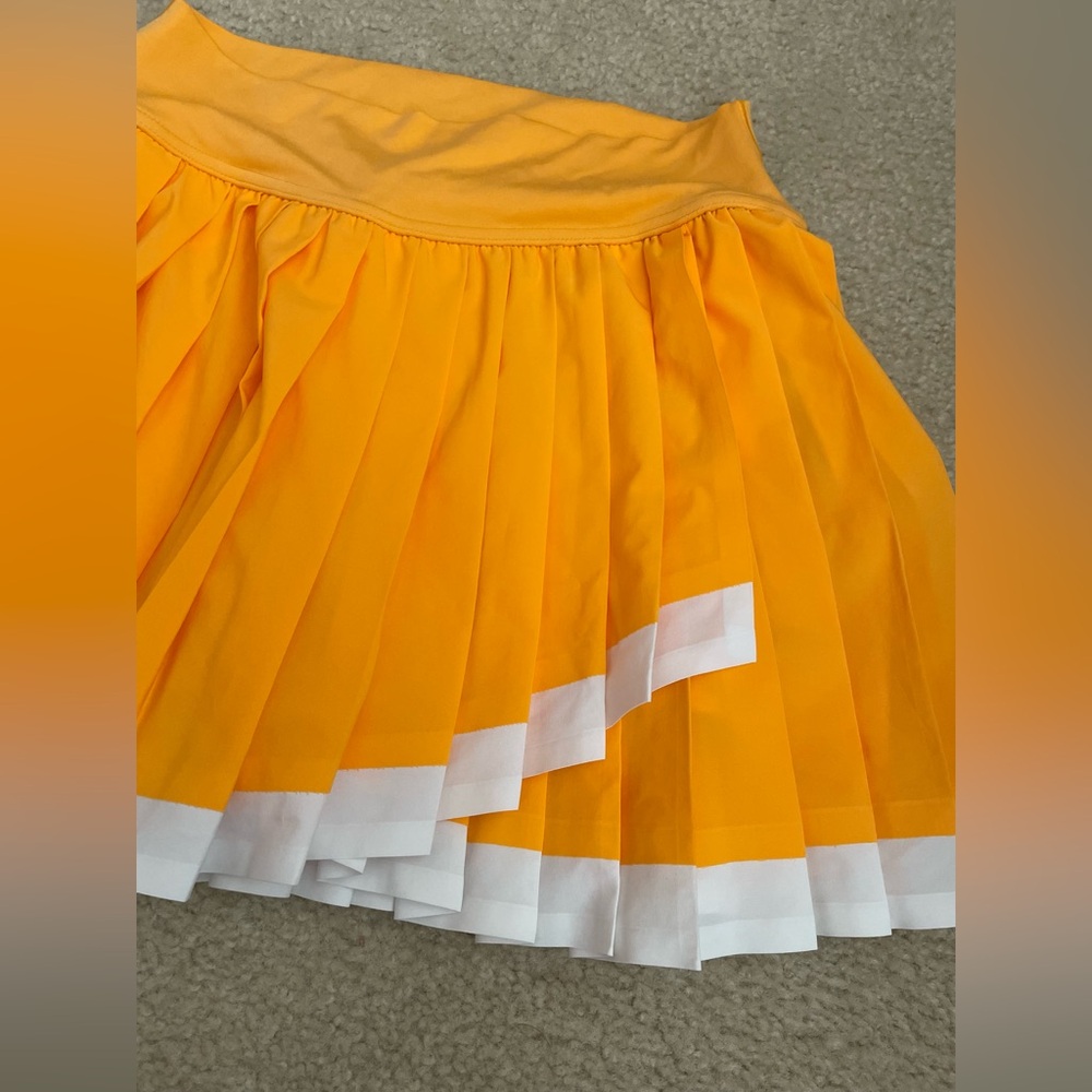 Aerie Offline Pleated Orange Skirt with White Trim and Built-in shorts - Picture 3 of 7